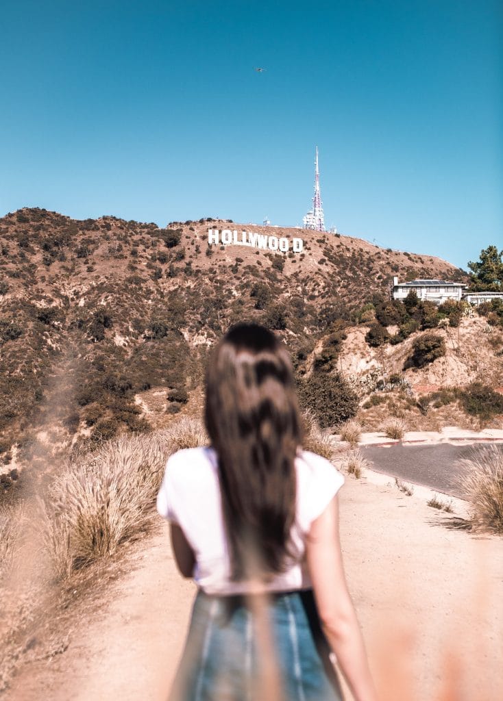 Woman looking at the Hollywood sign