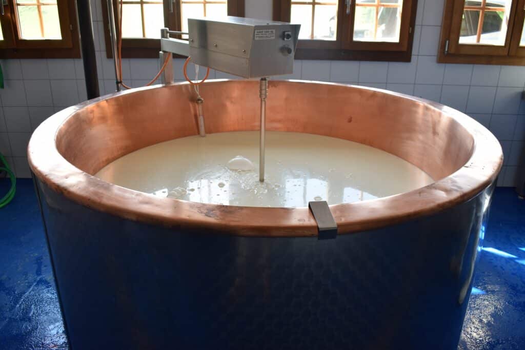 Cheese/whey being made.