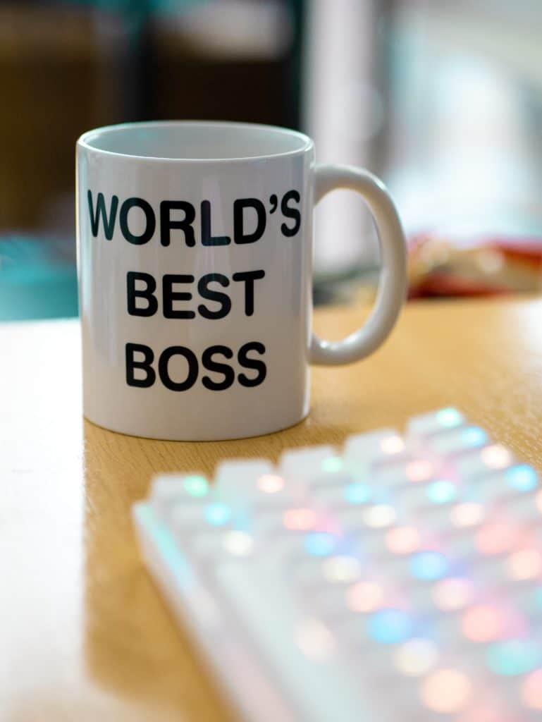 Close up of a World's Best Boss mug on a desk