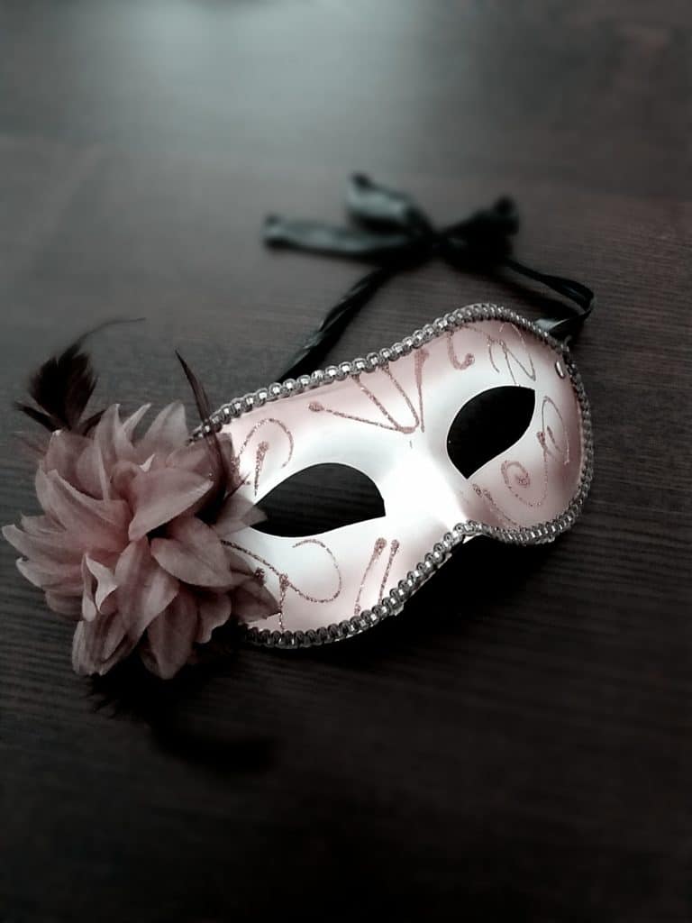 A pink masquerade mask