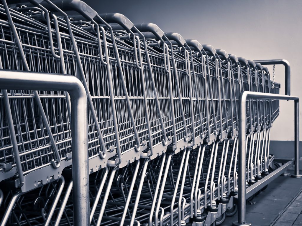 A black and white line up of shopping carts