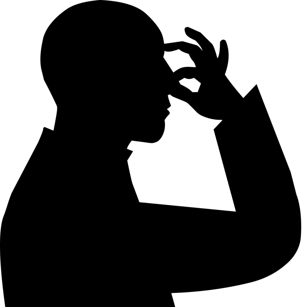 Silhouette of a man holding his nose