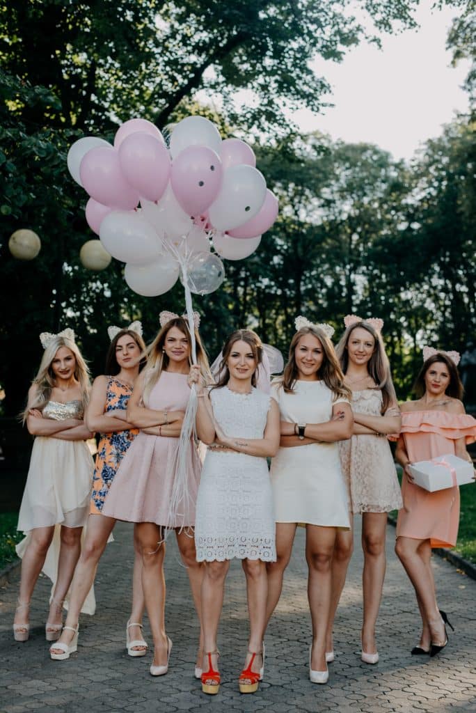A bride-to-be and her bridesmaids all in pink for a bachelorette party
