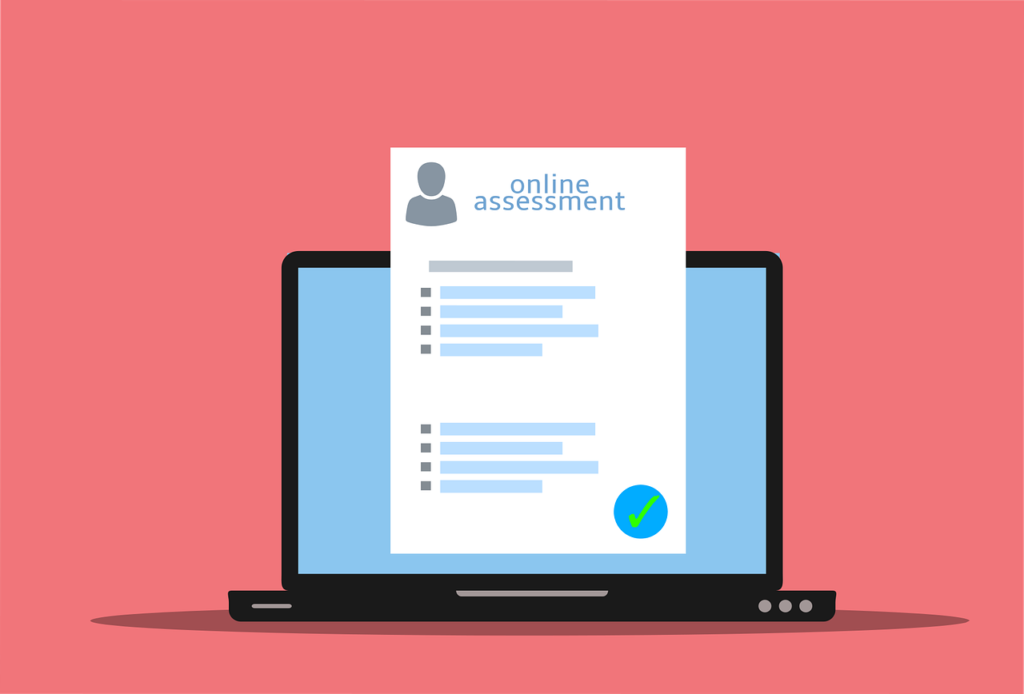 Vector image of a white screen in front of a black laptop that says "online assessment" against a pink background