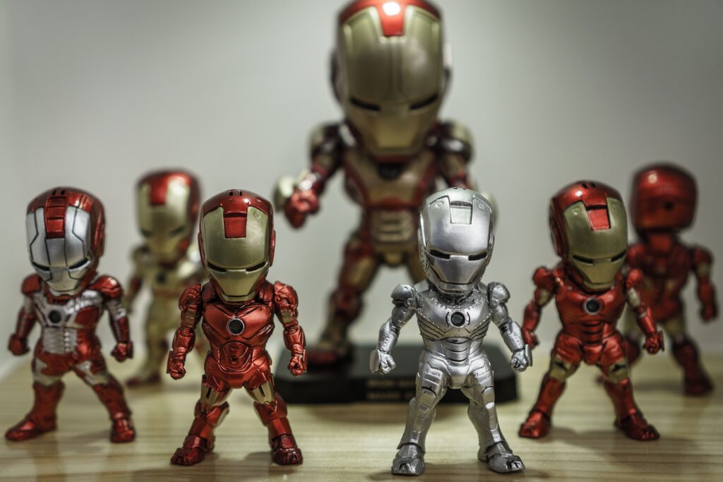 Numerous Iron Man figurines