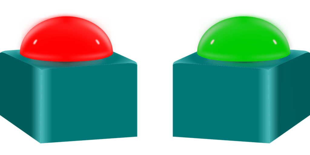 Vector image of two buzzers, one red and one green 