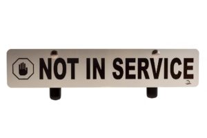 A white sign that reads "Not in Service" in black text