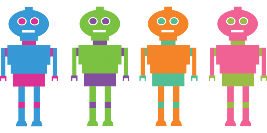 Four multicolored robots standing in a row