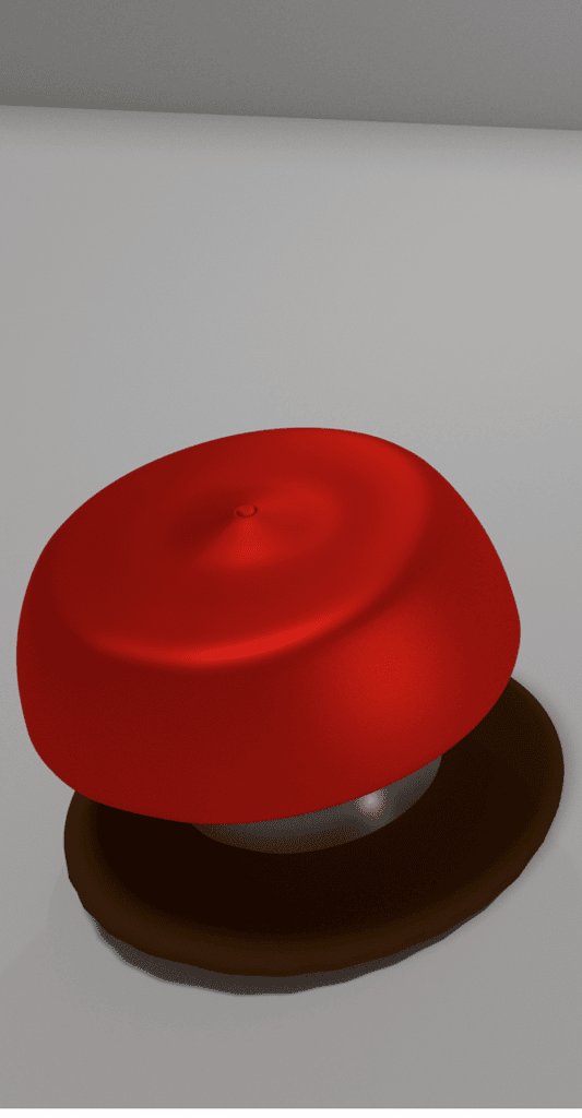 Image of a small red button