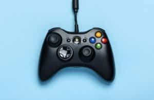 An Xbox controller against a light blue background