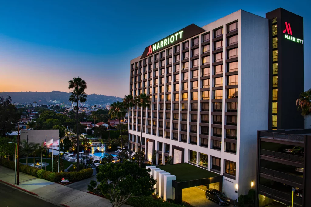 Photo of the exterior of the Beverly Hills Marriott in the evening