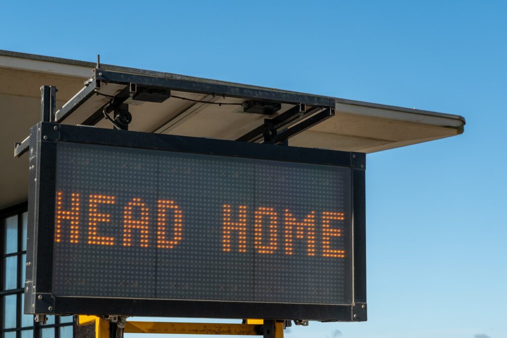 A digital scoreboard that reads "HEAD HOME"