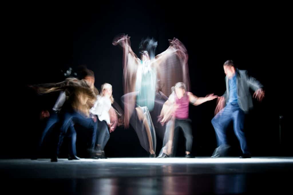 A group of people engaging in contemporary dance.