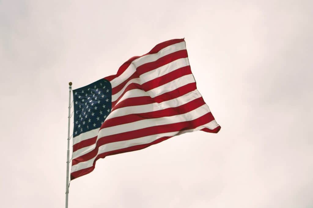 Photo of the American flag blowing in the wind