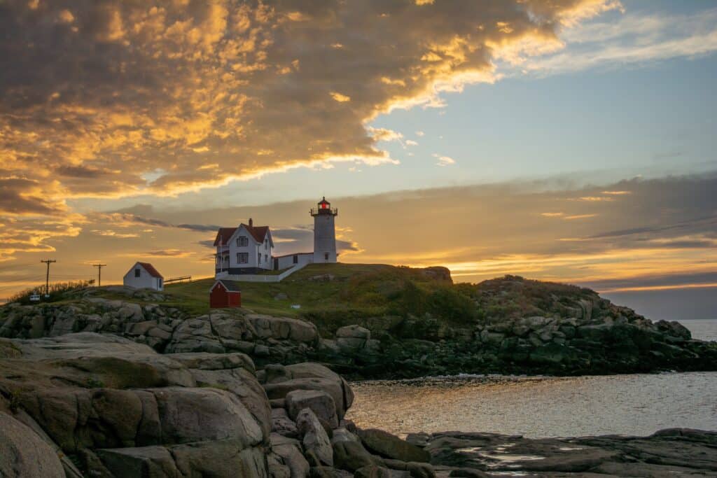 A New England lighthouse at sunset