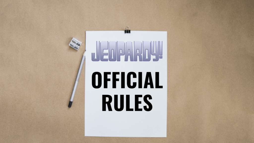 A pencil and pencil sharpener next to a white paper that reads "JEOPARDY! OFFICIAL RULES" against a beige background