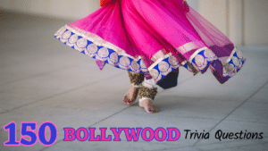 Photo of an Indian women's feet while dancing, wearing a pink and purple sari with text below it that reads "150 Bollywood Trivia Questions"