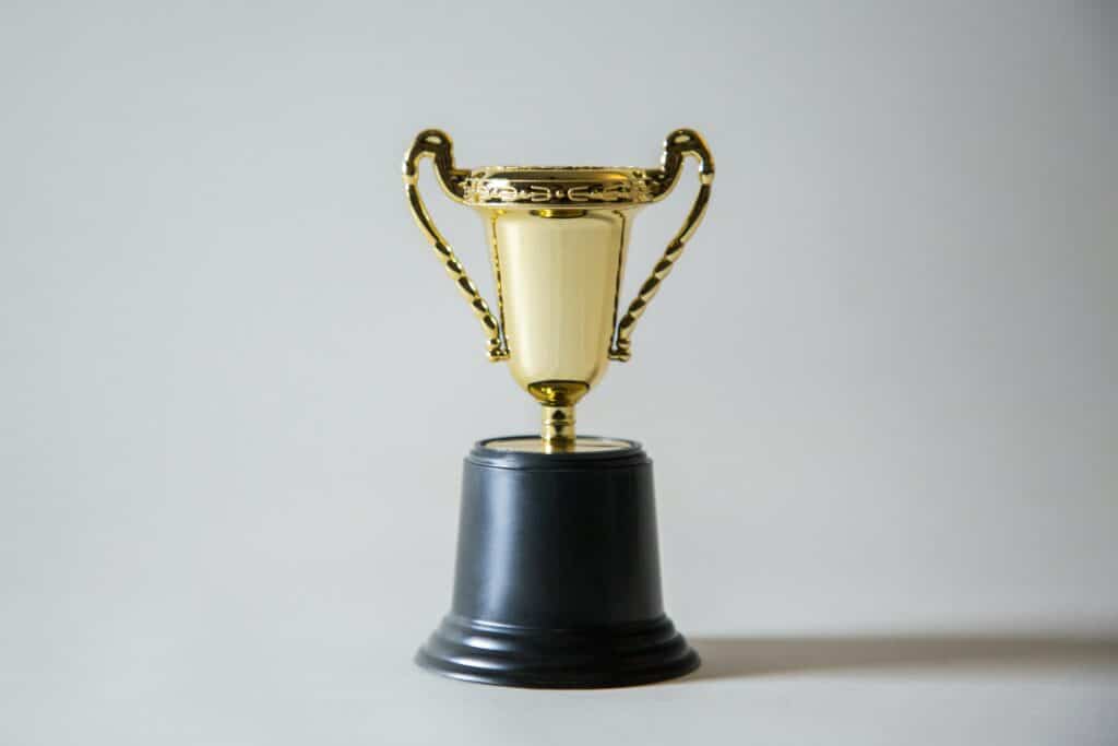 Photo of a gold trophy against a white background