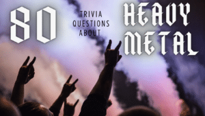 Photo of fans at a rock show holding up devil horn fingers in front of a stage filled with smoke, text above it reads "80 trivia questions about Heavy Metal"