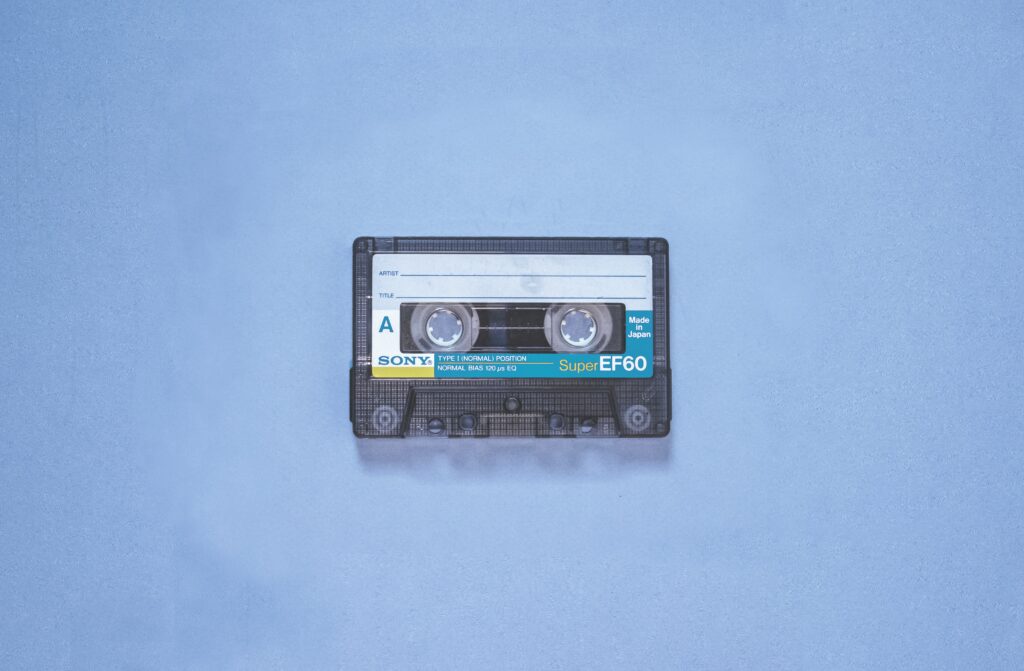 Photo of a Sony Super EF60 cassette tape against a blue background.