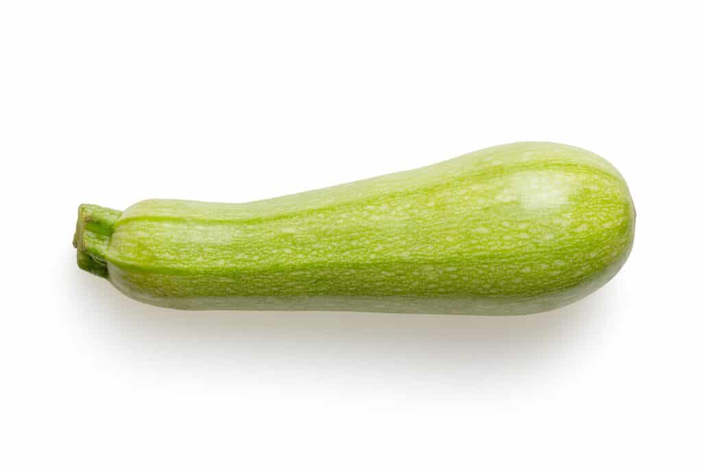 Photo of a green vegetable against a white background.
