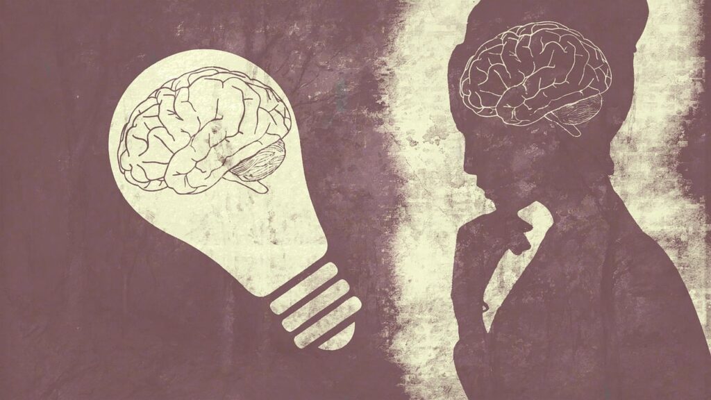Illustration of a light bulb with a brain in it next to the silhouette of a woman thinking, the diagram of her brain visible.