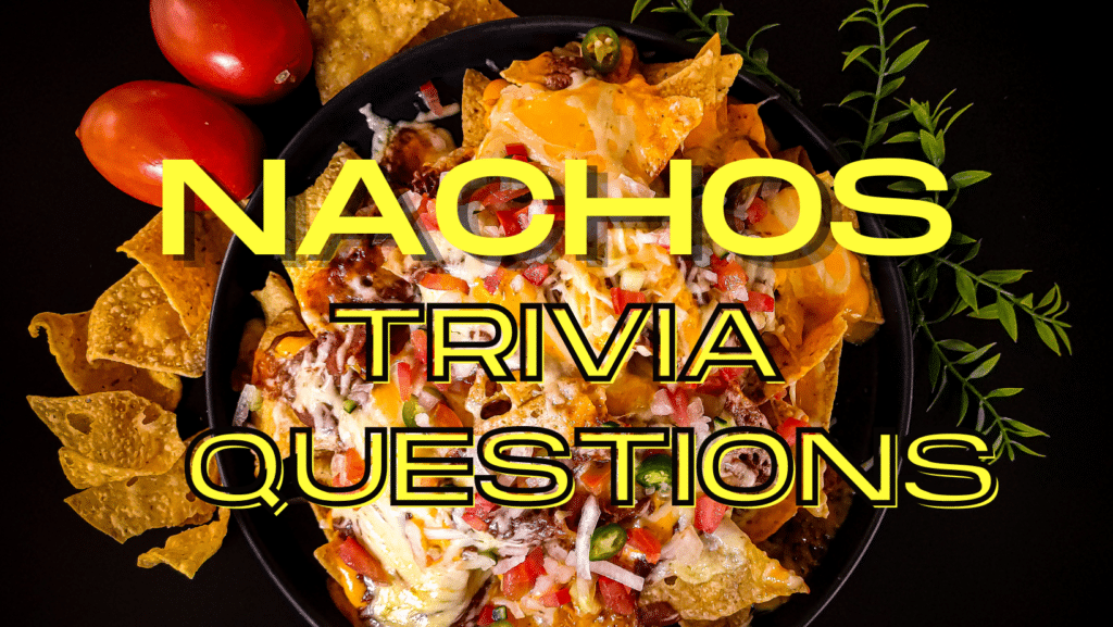Photo of nachos in a cast iron pan surrounded by herbs, tortilla chips, and cherry tomatoes against a black background. Yellow text over the image reads "Nachos Trivia Questions"
